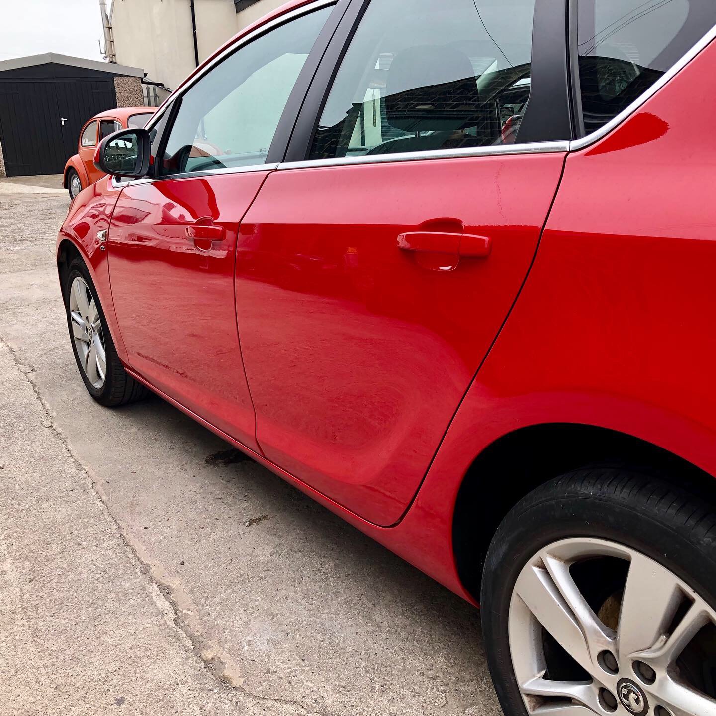 Glossy red vehicle side panels