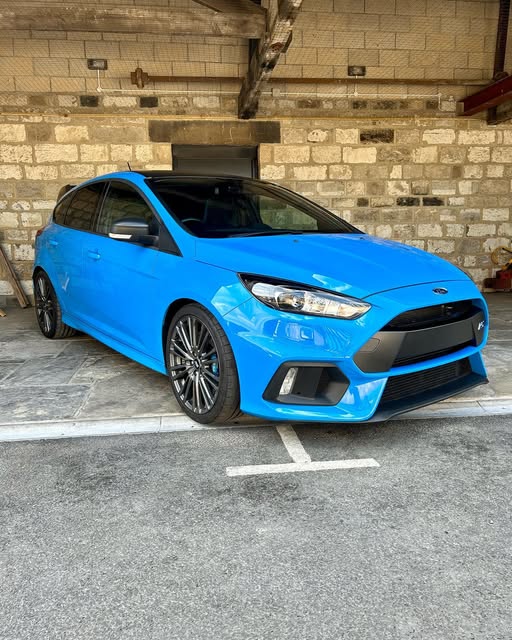 Blue Ford Focus RS at the stone-built OCD Refinishing workshop